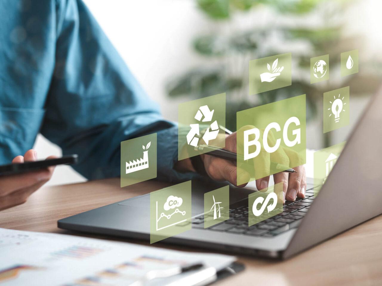 Businessman using computer to study BCG for sustainable economic development. BCG concept, bioeconomy, circular economy, green economy. with an icon on the screen